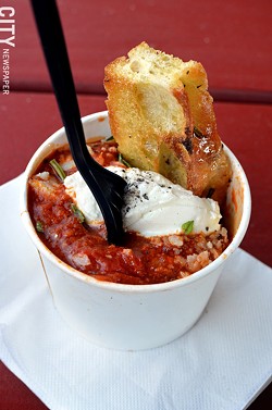 The Meatball Truck Co. meatballs in a cup with bread. - PHOTO BY MATT DETURCK