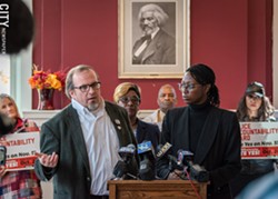 Police-oversight activists Ted Forsyth, left, and Stanley Martin, at a press conference last week urging passage of the Police Accountability Board referendum. - PHOTO BY RYAN WILLIAMSON