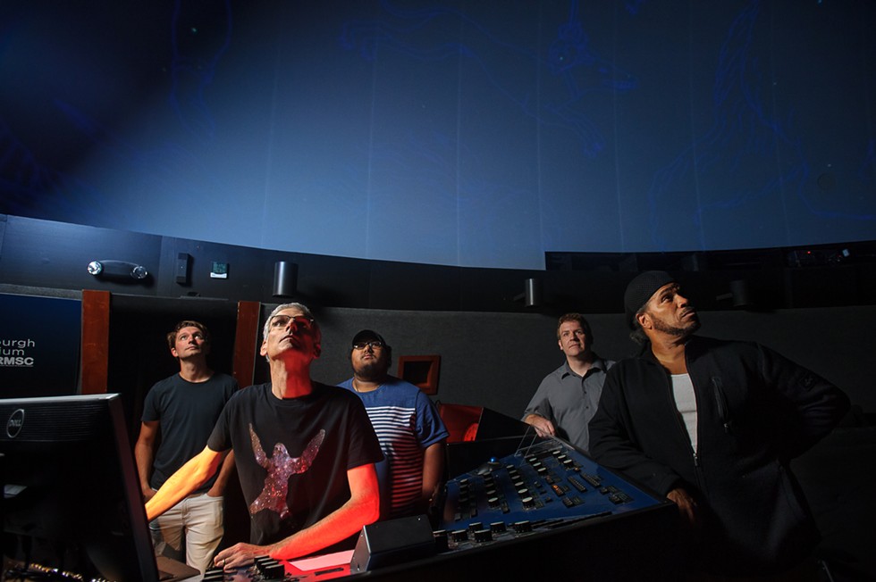 (Left to right) Drummer Tommy Mintel, Steve Fentress, bassist Luis Carrion, keyboardist Ian Sherman and guitarist Brother Wilson at the Strasenburgh Planetarium. - PHOTO BY DORIAN MODE