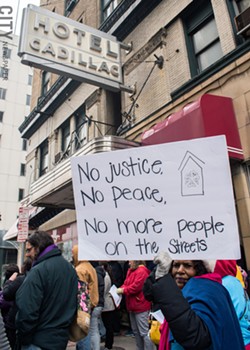 Advocates for quality, affordable housing protesting in April 2019 in front of the Hotel Cadillac in downtown Rochester. - FILE PHOTO