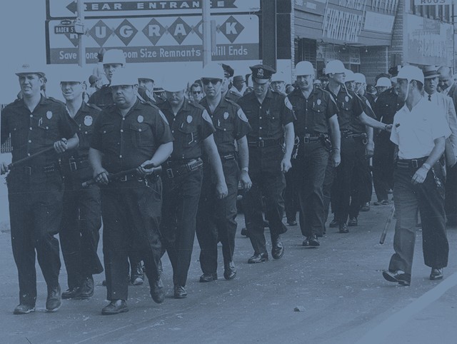 Rochester Police Department officers don helmets and batons during the riots of 1964, the same year the Rochester Police Locust Club negotiated its first labor pact with the city. - PHOTO COURTESY THE CITY OF ROCHESTER