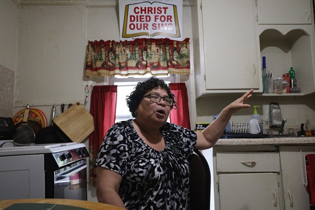 Nancy Hernandez Maciuska, a member of the Lewis Street Committee, in her home on Finney Street. "Everything was just taken away from us," she says of the Inner Loop's impact on the neighborhood. - PHOTO BY MAX SCHULTE