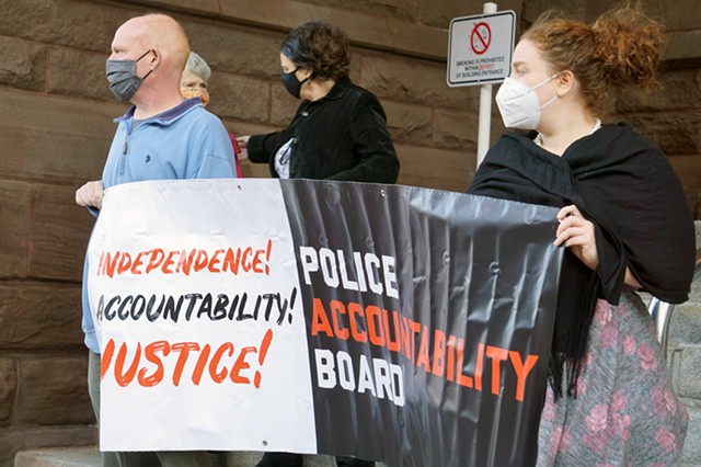 Police Accountability Board supporters during a past event in front of Rochester City Hall. - PHOTO BY GINO FANELLI