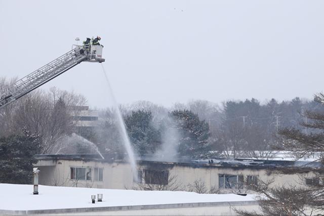 Firefighters from across Monroe and Wayne Counties responded to Tuesday morning's fire at the Pines of Perinton. - PHOTO BY MAX SCHULTE