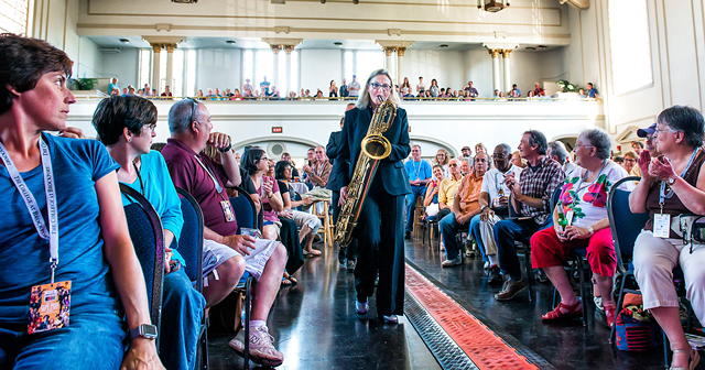 Holly Cole'S band makes an entrance at Harro East Ballroom during the Rochester International Jazz Festival, pre-pandemic, in 2015. - PHOTO BY FRED SANFILIPO