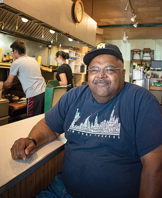 James Brown occupies his familiar spot at the lunch counter of his namesake diner, James Brown’s Place.