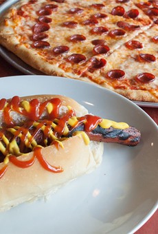 At The Old Stone Tavern you can build your own hot dog and pizza. Pictured is the Veggie Dog (made with a marinated carrot) and the Cup n' Char Pepperoni pizza.